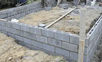 Professionals building a foundation with blocks in Stockton, CA