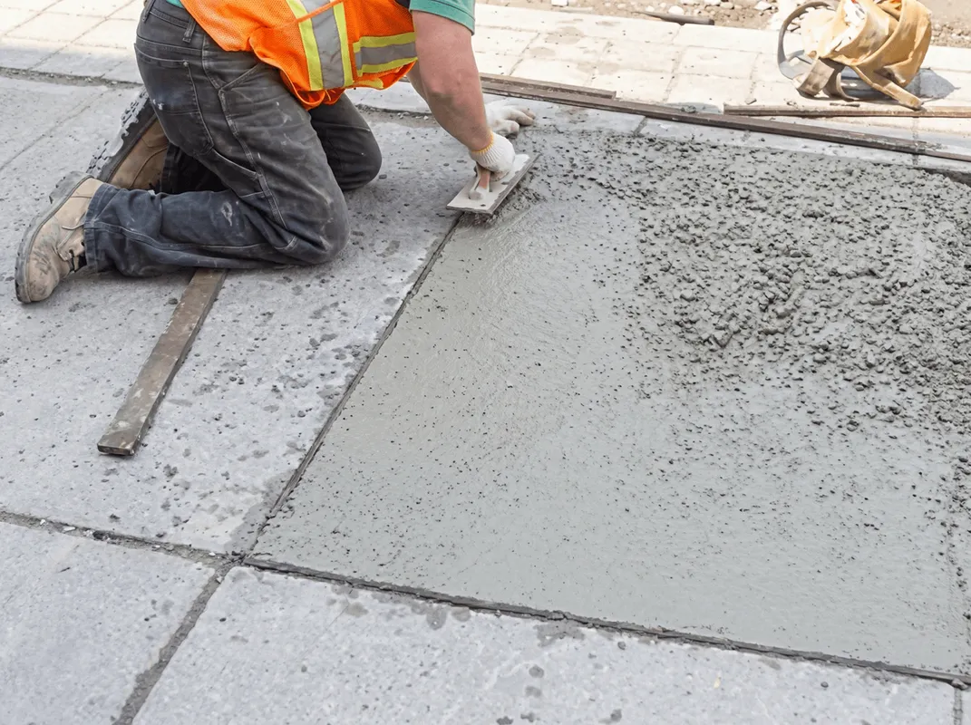 Professional repairing a concrete floor in Stockton, CA
