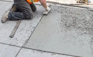 Professional repairing a concrete floor in Stockton, CA
